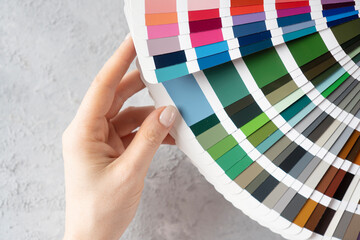 Color catalogue background. Choosing color for wall painting.