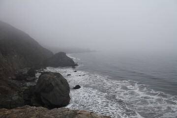 waves crashing on rocks