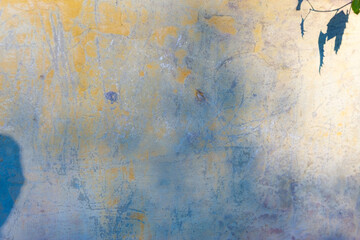 Obraz premium blue with dark blue old plaster texture on the street wall of the house