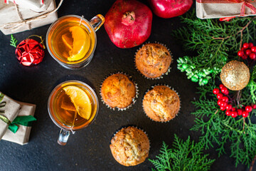 homemade muffins cupcakes and cup of tea christmas festive table setting holidays festive party new year gift tasty serving size portion top view copy space food background rustic