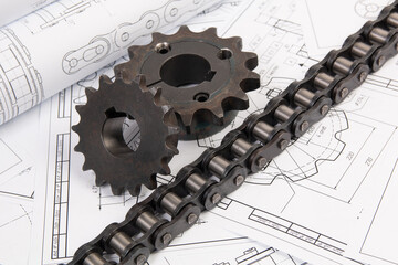Driving industrial roller chain and sprocket on a print engineering drawings - obrazy, fototapety, plakaty