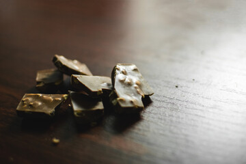 Chocolate candy on a wooden background