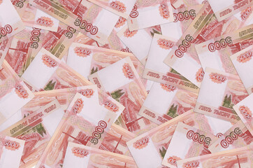 5000 russian rubles bills lies in big pile. Rich life conceptual background