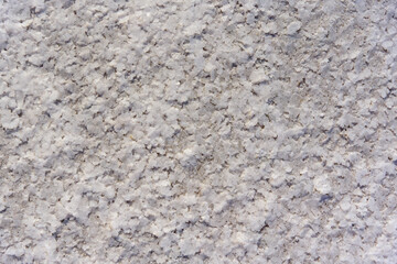 Salt crystals above view glossy soft texture close up.
