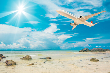 Fototapeta na wymiar Airplane flying on summer sea.