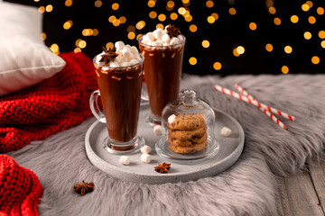 Hot chocolate with marshmallow on wooden table
