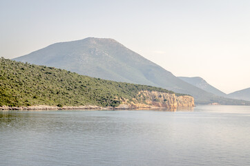 Evia island, Greece - June 28. 2020: Panorama of the Greek island of Evia from the ferry 