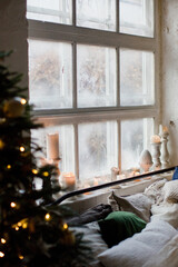 Christmas loft bedroom with decorations and lights