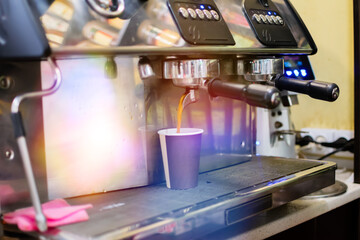 Fototapeta na wymiar Coffee machine making a cup of coffee