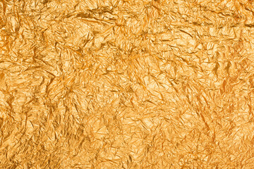 Abstract texture background of wrinkled golden paper.