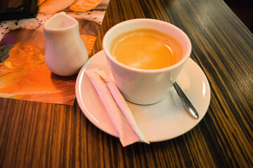 Cup Of Coffee On Table In Cafe