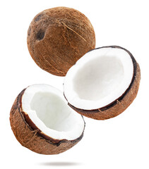 Coconut whole and half falling on a white, isolated. Levitating coconut