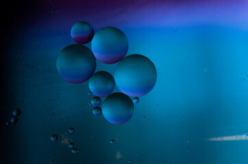 Macro photo of oil bubble on the water