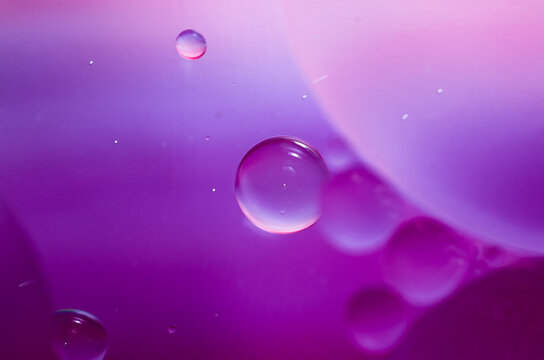Macro photo of oil bubble on the water