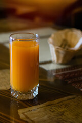 Fresh Orange Juice On Wooden Table In Cafe
