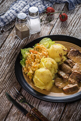 Braised pork tongues in horseradish sauce.