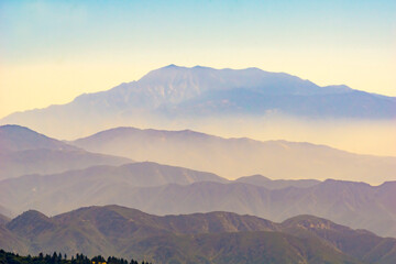 Mountain layers rising to distant peak