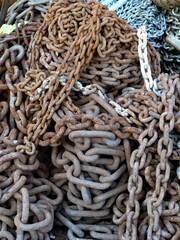 Piles of used, rusty chains.