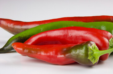 close up of colored peppers isolated on white