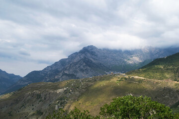 View of the mountains of the North Caucasus. Mountains in the clouds in summer