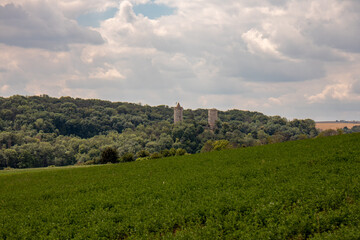 Fototapeta na wymiar Panorama of the castle ruins Rudelsburg and Saaleck in the landscape and tourist area Saale valley on the river Saale near the world cultural heritage city of Naumburg, Saxony Anhalt, Germany