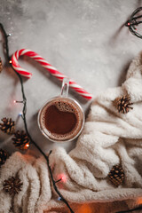 Flat lay for New Year, Christmas. Garland, candy canes, cocoa and cones, Christmas mood.
