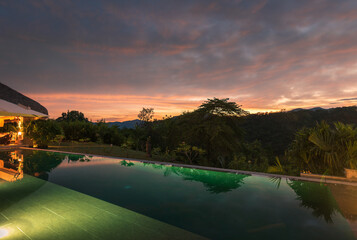 sunset over pool