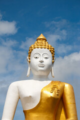 Big buddha in Wat Phra That Doi Kham (Temple of the Golden Mountain)