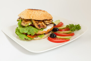 Vegetarian burger with zukini and assorted vegetables