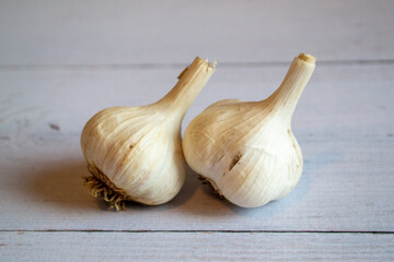 Two beautiful heads of garlic on the table