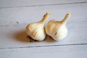 Two beautiful heads of garlic on the table