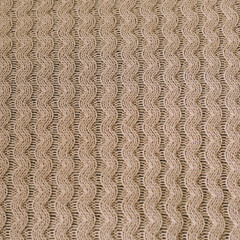 Knitted texture background. Knitting pattern of wool. Knitting. Texture of woolen fabric for wallpaper and abstract background.