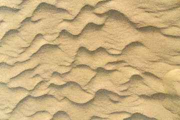 Texture of ripples in the sand in desert. Nature background