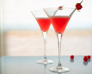 Pink cocktail with cherry