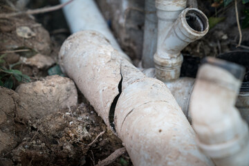 Repair and replacement of broken waste water pvc plastic sewer pipe, drainage of waste water from...