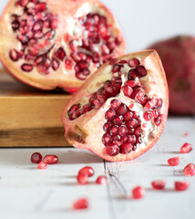 pomegranate on a  white table