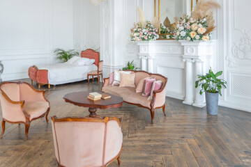 royal baroque style luxury posh interior of large room. extra white, full of day light. high ceiling and walls decorated by stucco