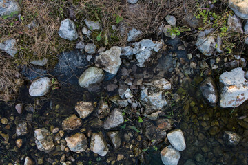 Small stones of gray color texture background.