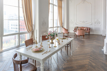 royal baroque style luxury posh interior of large room. extra white, full of day light. high ceiling and walls decorated by stucco