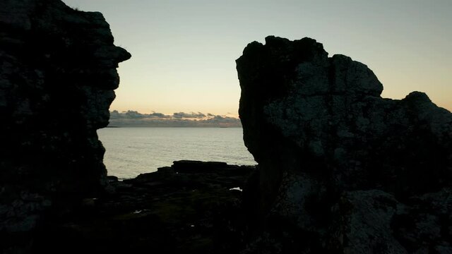 Flying between rauks limestones. Island of Gotland, Sweden.