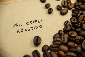 own coffee roasting slogan on coffee filter with stamps and beans