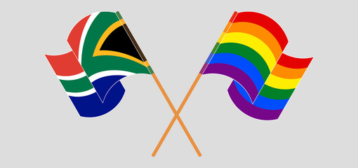 Fototapeta premium Crossed and waving flags of Republic of South Africa and LGBTQ