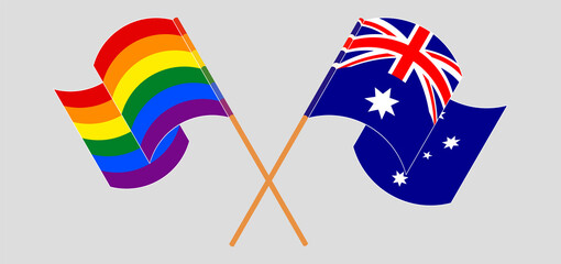 Crossed and waving flags of Australia and LGBTQ