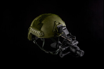 Night vision device attached to the helmet. A special device for observing in the dark. Equipment...