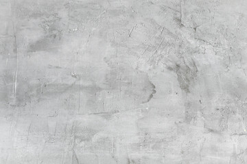 White texturized stucco concrete wall background. Grunge gray painted cement wall texture.