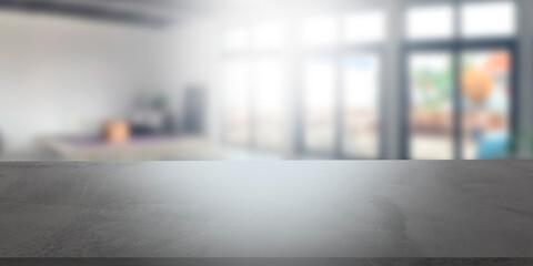 Empty stone concrete table with blurred soft light loft factory business background. product...