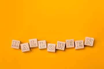 background design in the style of Halloween, letters on wooden cubes.