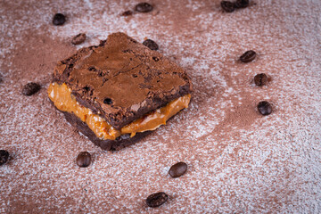 Chocolate brownie with delicious dulce de letche filling. Closeup photography.