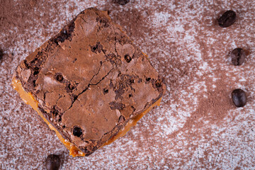 Chocolate brownie with delicious dulce de letche filling. Closeup photography.