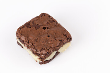Chocolate brownie with milk powder delicious filling. Closeup photography.